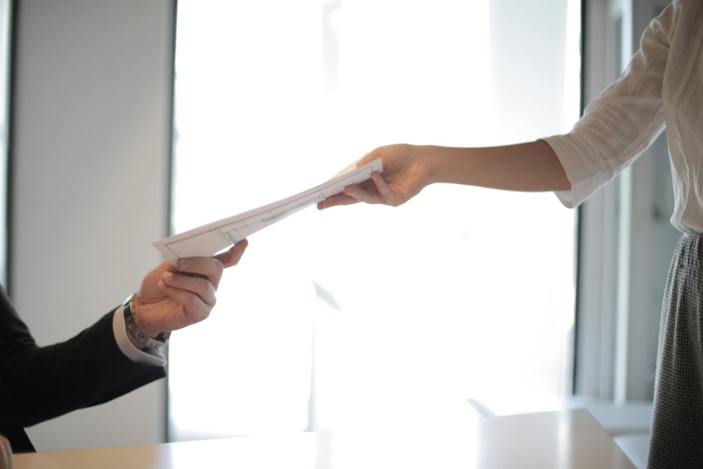 pexels-photo-3760072-3760072 Job Applicant Passing Her Documents